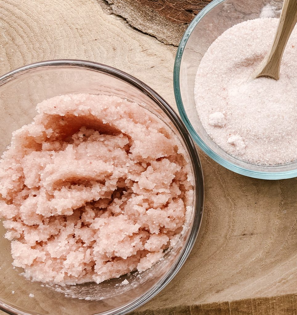 pink himalayan salt scrub and salt in glass bowls